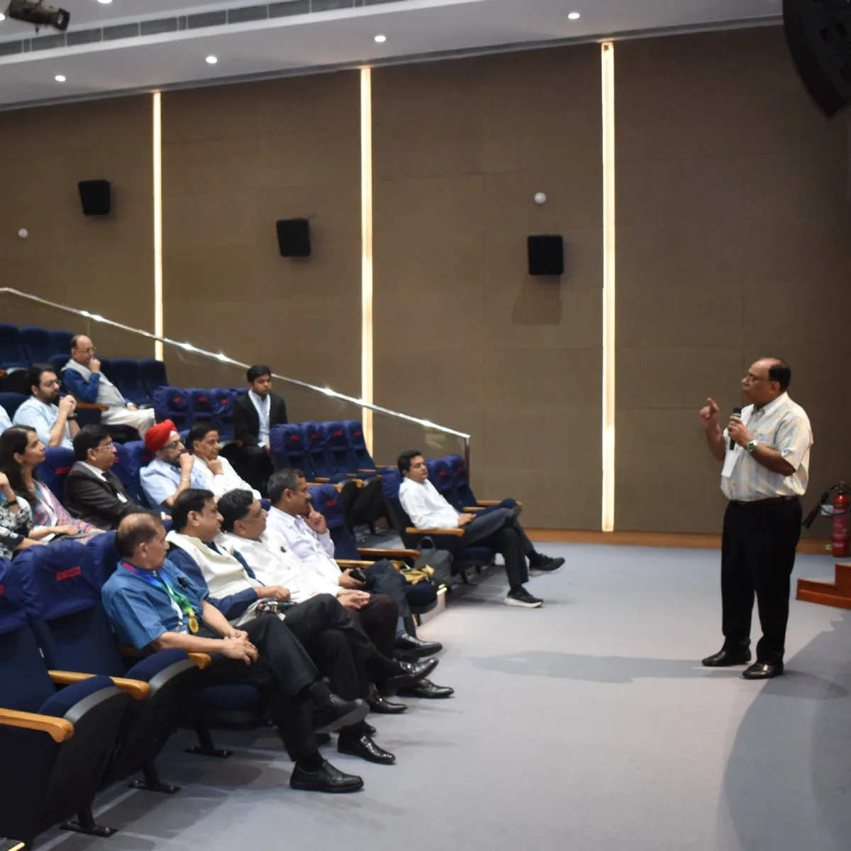 HAPICON 2024 — speaker addressing audience in conference hall