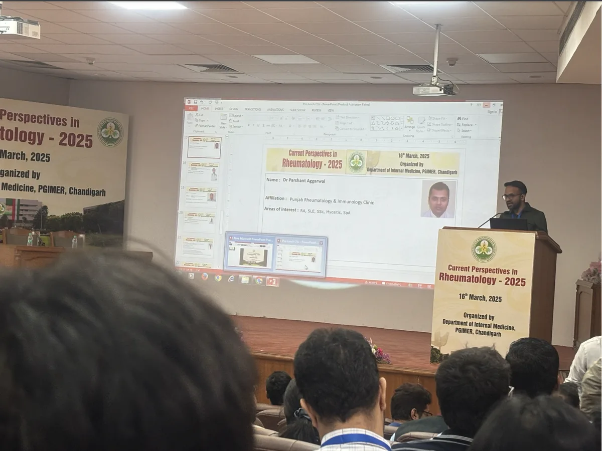 Current Perspectives in Rheumatology 2025 — speaker at podium presenting