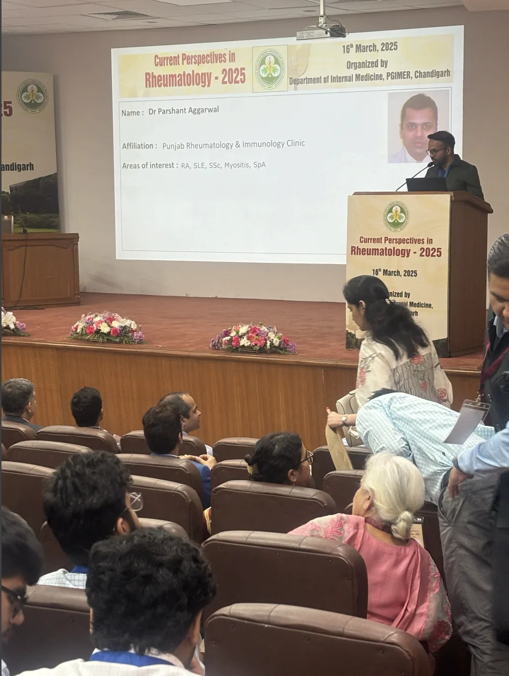 Current Perspectives in Rheumatology 2025 — speaker Dr Parshant Aggarwal at podium