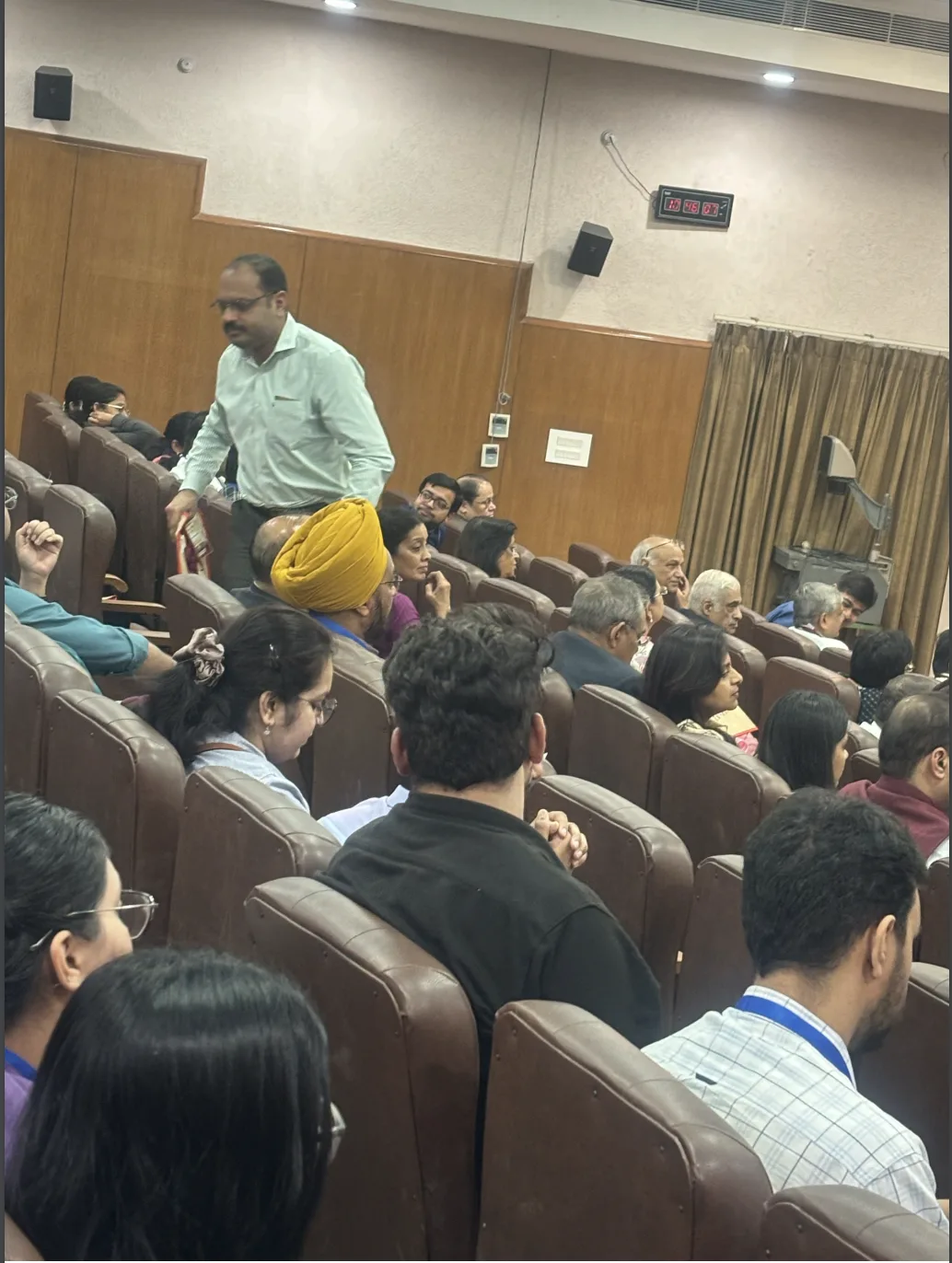 Current Perspectives in Rheumatology 2025 — audience seated in conference hall